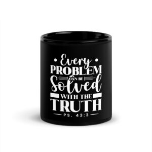 Black mug with a motivational quote about truth and problem-solving.